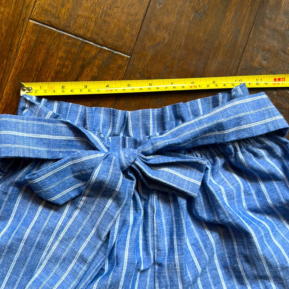 Blue and white striped ruffled shorts